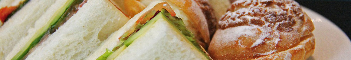 Eating Breakfast & Brunch Sandwich at Espresso By Design restaurant in Seattle, WA.